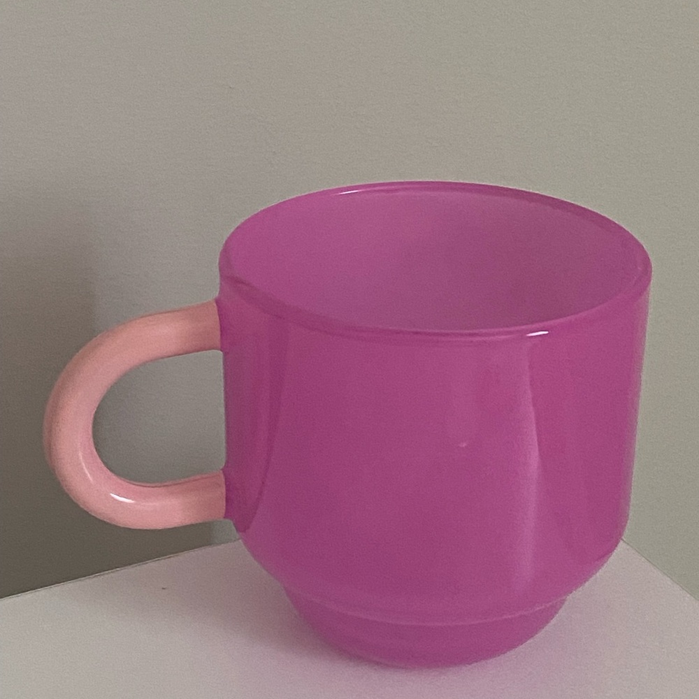 2 Pink glass mugs